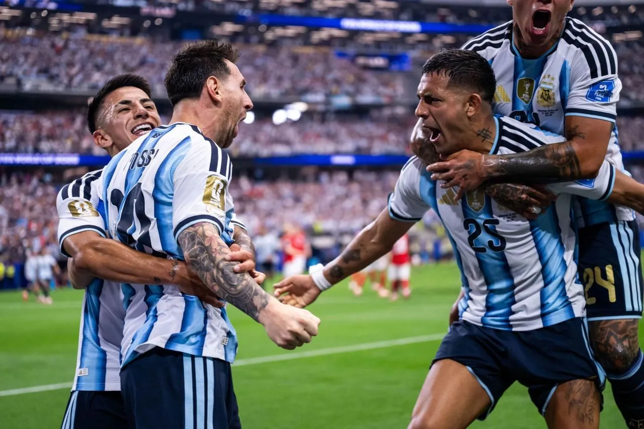 Lionel Messi scores his second goal against Austria to seal Argentina victory